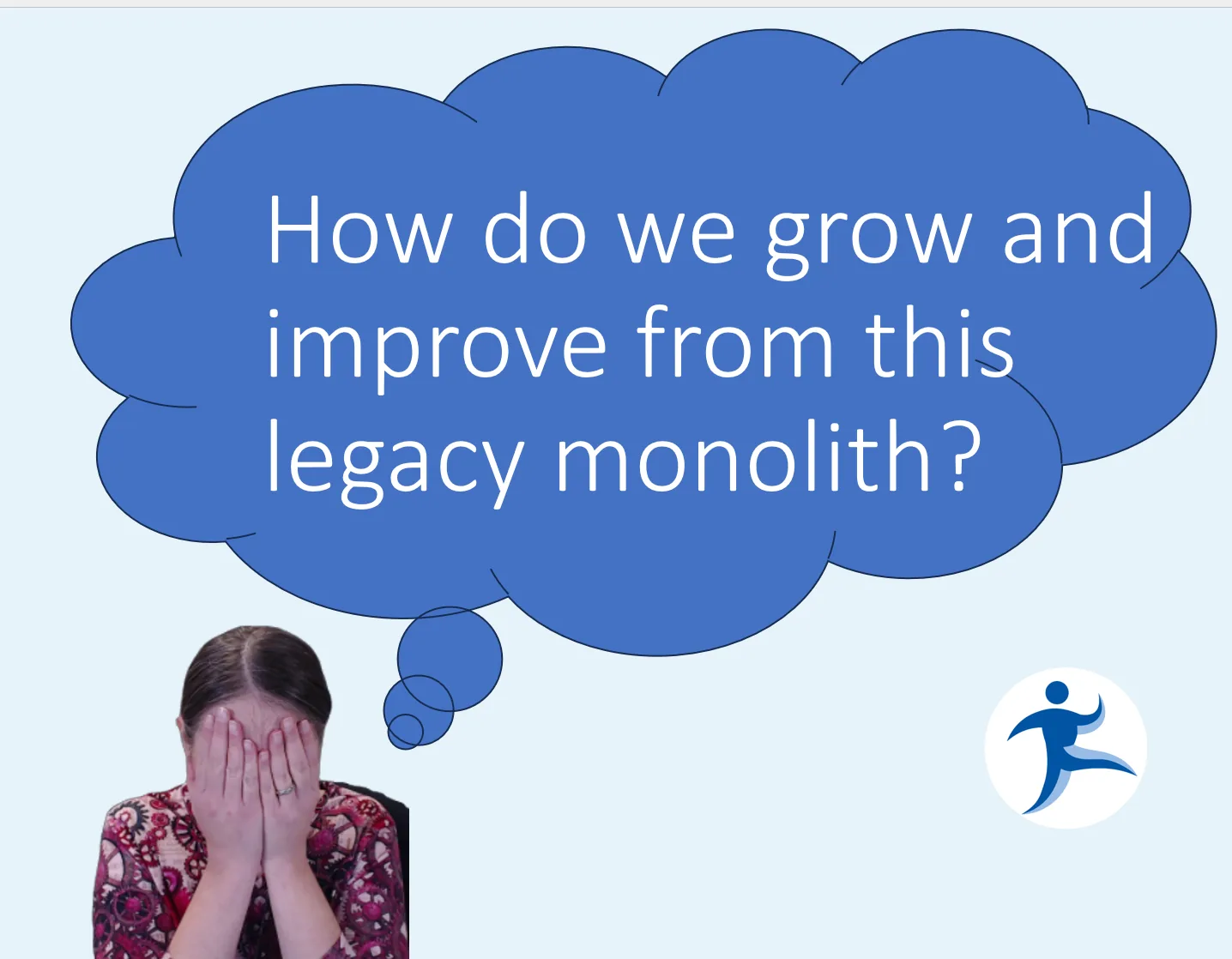 Sadukie covering her face, wondering &ldquo;How do we grow and improve from this legacy monolith?&rdquo;