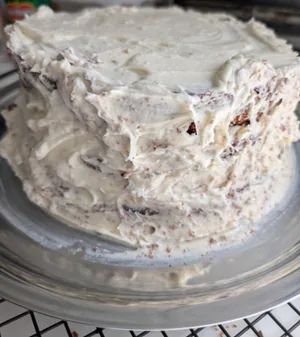 Cakes stacked with a lot of frosting